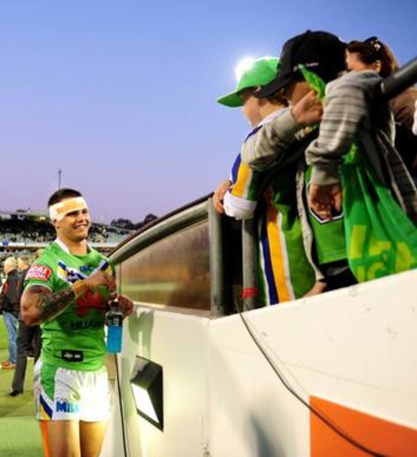 Sandor Earl greets fans after the match.