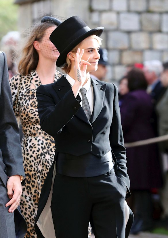Cara Delevingne arrives ahead of the wedding of Princess Eugenie of York and Jack Brooksbank.