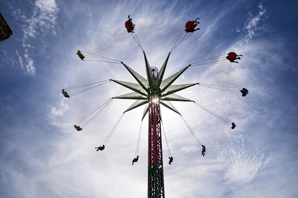 People enjoying the rides at Moomba.