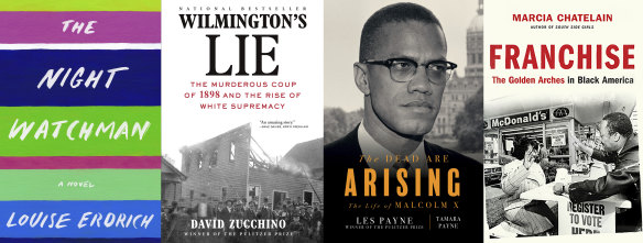 From left, The Night Watchman by Louise Erdrich, winner of the Pulitzer Prize for fiction, Wilmington’s Lie: The Murderous Coup of 1898 and the Rise of White Supremacy by David Zucchino, winner of the Pulitzer Prize for general nonfiction, The Dead Are Arising co-authored by Tamara Payne and her father Les Payne, winner of the Pulitzer Prize for biography and Franchise: The Golden Arches in Black America by Marcia Chatelain, winner of the Pulitzer Prize for history. 