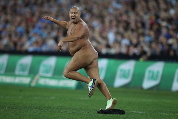 A streaker on the pitch.