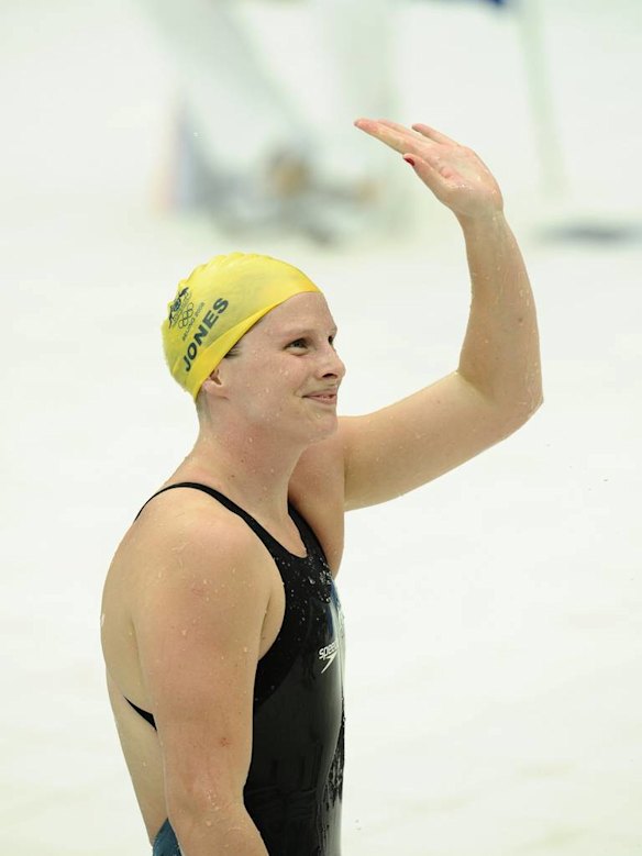 Leisel Jones waves to the crowd after her gold medal win in the women's 100m breaststroke final in Beijing in August, 2008.