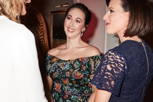Pink Hope founder Krystal Barter (L) and Channel Ten news' Natarsha Belling (R) mingle at a dinner at The Langham, Sydney, on Monday, August 7, to celebrate the launch of Pink Hope's new online test that helps women assess their personal risk of developing breast and ovarian cancer.