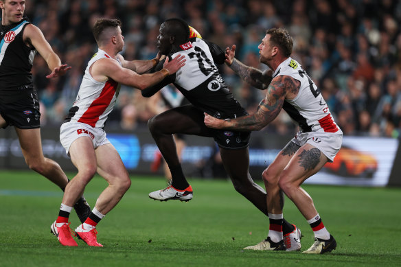 Under review: St Kilda forward Jack Higgins tackles Aliir Aliir on Friday night.