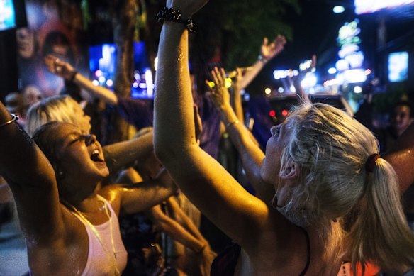 Australian Schoolies in Bali dancing on the main street in Legian outside the Bounty nightclub, 2014.