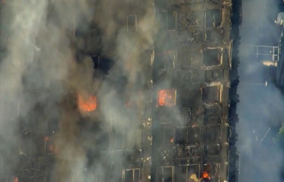 A massive fire raced through the 27-storey high-rise apartment building in west London early Wednesday, sending at least 30 people to hospitals, emergency officials said. 