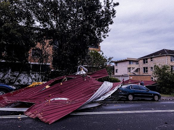 Damage is seen on Griffin road, Dee Why after a "microburst" - a severe storm downdraft often with winds exceeding 80km/hour  ripped off roofs and uprooted trees.