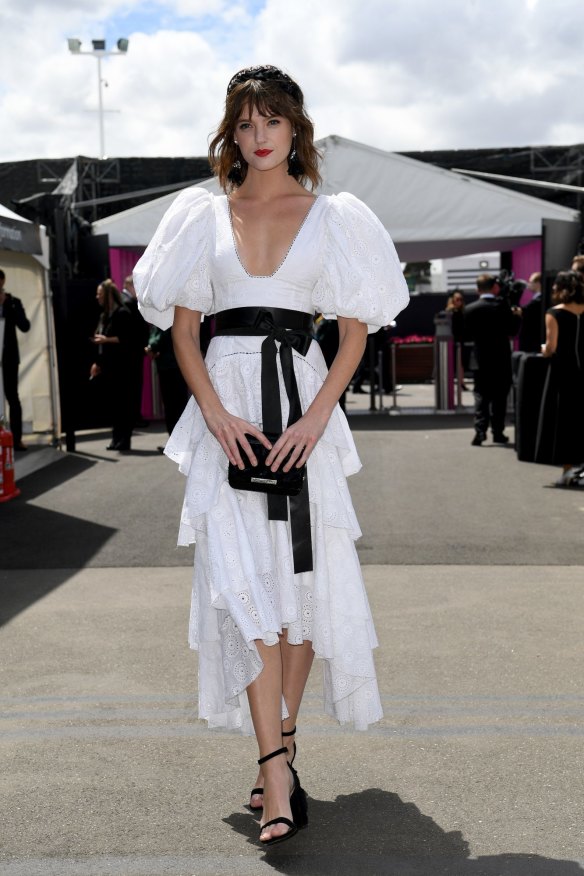 Montana Cox wore a big black bow to finish her Derby Day look.