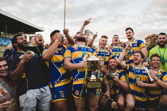 Woden Valley Rams captain Jeffrey Morgan celebrates their win.
