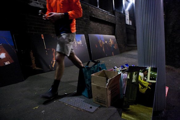 A group of Sydney based photographers have set up an impromptu photography exhibition along the walls of buildings on Elizabeth Street.