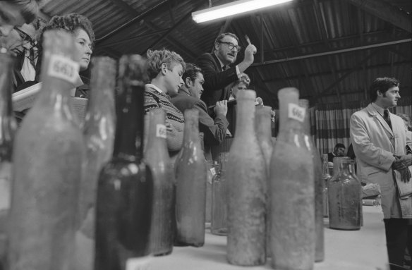 Auction of old bottles at Parramatta on May 20, 1970. Pictured is auctioneer Bob Steer. 