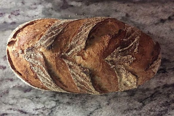 A loaf of light rye sourdough bread from Noosa Hot Bread Shop.