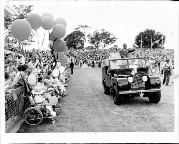 At the opening of Parramatta Stadium by the Queen, children from Northcott Special School greet the royal Land Rover on March 5, 1986.
