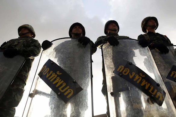 Soldiers block access to the Army Club.