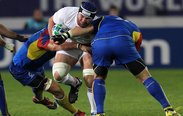 Vakhtang Maisuradze charges into the Romanian defence.