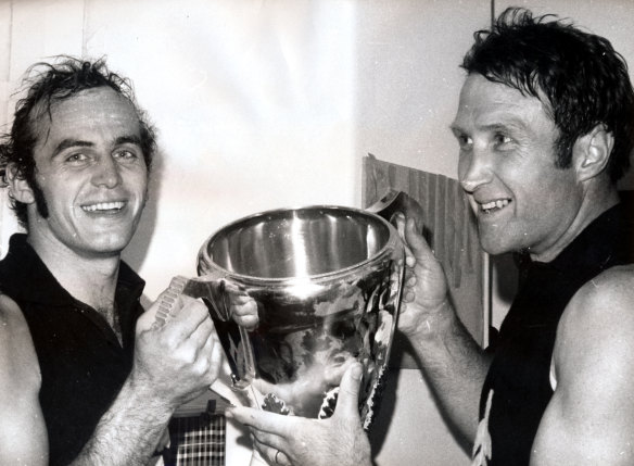 Carlton’s Alex Jesaulenko (left) and captain-coach John Nicholls (right) hold the 1972 premiership cup after the Blues’ pulled a tactical masterstroke.