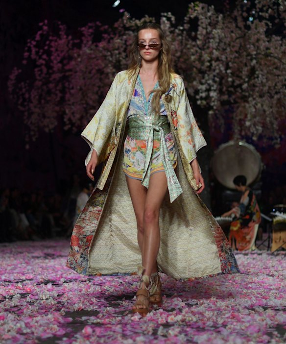 A model walks the runway wearing creations by Camilla at  Mercedes-Benz Fashion Week Australia in Sydney.