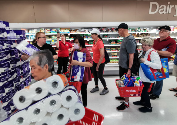Australians rushed into supermarkets to hoard supplies in the coronavirus crisis.