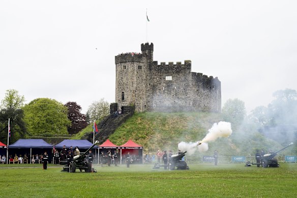 The 104 Regiment Royal Artillery fires round at Cardiff Castle, Wales to mark the coronation of King Charles III and Queen Camilla.