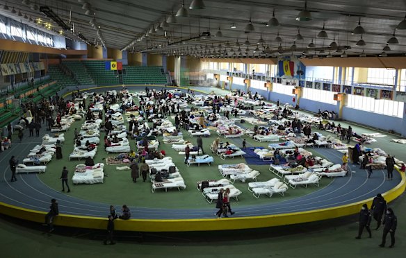 Refugees from Ukraine rest inside a facility for refugees in Chisinau, Moldova.