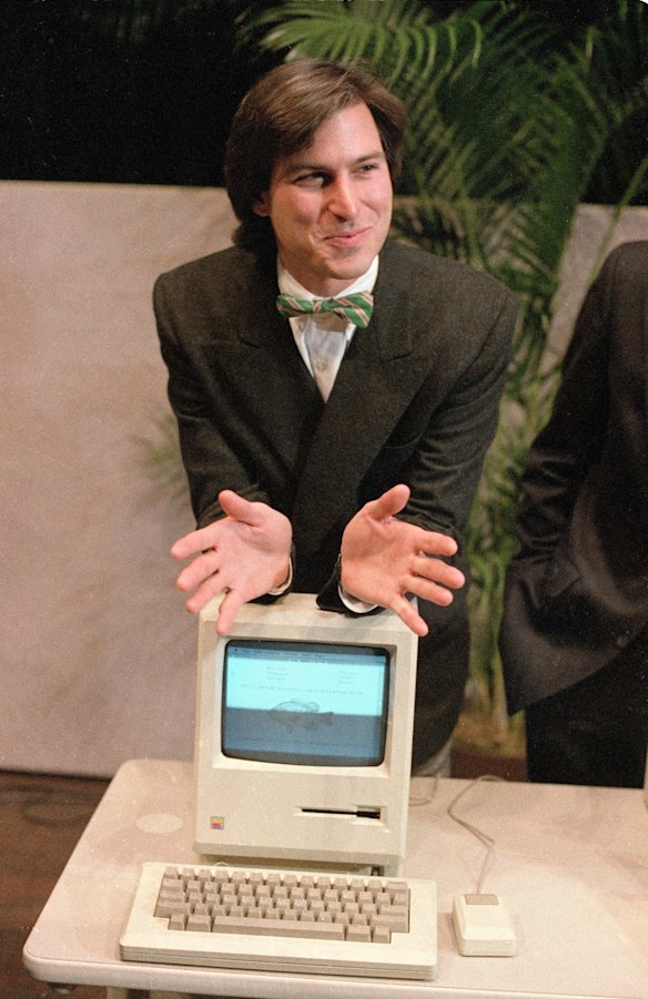 Steve Jobs with the new Macintosh personal computer following a shareholder’s meeting in Cupertino, California, in January 1984.
