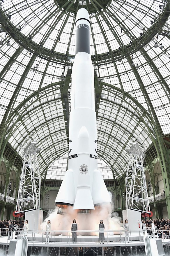 Karl Lagerfield completed his space-age fashion mission with a mock rocket launch. 