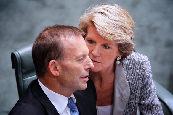 Deputy Opposition Leader Julie Bishop speaks to Opposition Leader Tony Abbott during question time at Parliament House in 2012.