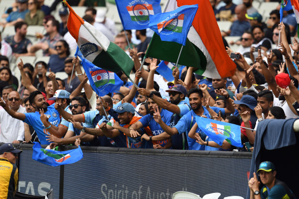 Passionate Indian fans celebrate at the MCG. Cricket Australia wants state governments to help turn Test matches into greater cultural events.