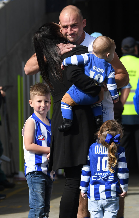Emotional scenes: Ben Cunnington with his family before the game.