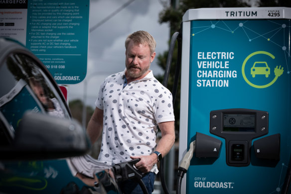 Greg Noonan charging his electric car on the Gold Coast. 