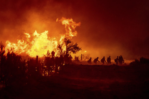 Huge wildfires across the western US states have followed a severe heatwave, made worse by a deepening drought.