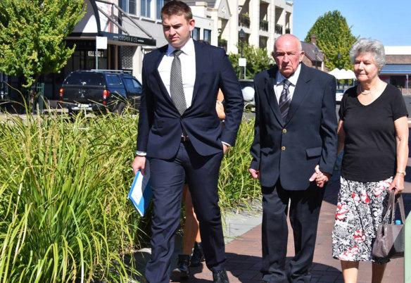Neville Newman and his wife Susan leave Armidale Local Court with solicitor Thomas Payne in February.