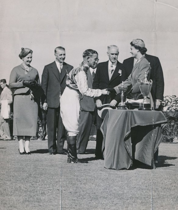Jockey Bill Williamson is congratulated by the Queen after his win on Sunish in the Duke of Edinburgh Australian Cup at Flemington Racecourse, 2th February, 1954. 
