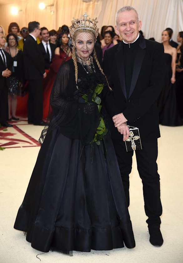 Madonna, left, and Jean Paul Gaultier attend The Metropolitan Museum of Art's Costume Institute benefit gala celebrating the opening of the Heavenly Bodies: Fashion and the Catholic Imagination exhibition on Monday, May 7, 2018, in New York. 