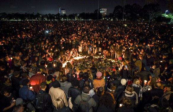 Thousand of people attend a candlelight vigil in solidarity for the Melbourne comedian Eurydice Dixon who was found dead at Princes Park in North Carlton last week.
