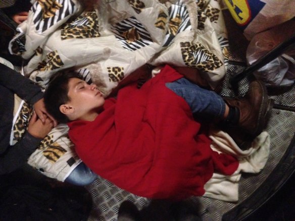 Migrants board buses said to be bound for Austria outside Keleti station in central Budapest, Hungary.