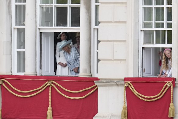 Camilla, Duchess of Cornwall takes a sneaky look at the Trooping the Colour.