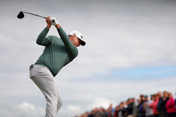 Lee Westwood, an early defector, tees off on the fourth hole at the 150th Open at St Andrews Old Course.