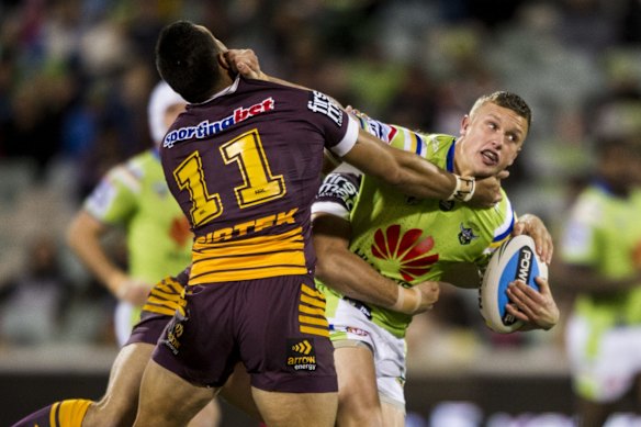 Jack wighton of the Canberra Raiders tackled by Alex Glenn of the Brisbane Broncos.