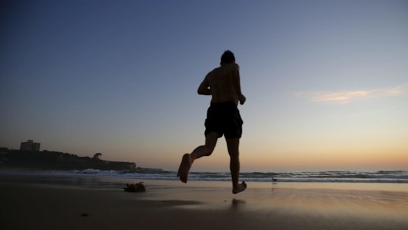 Rafael Minnicelli, from Balmain, running in for a swim, before heading to work.