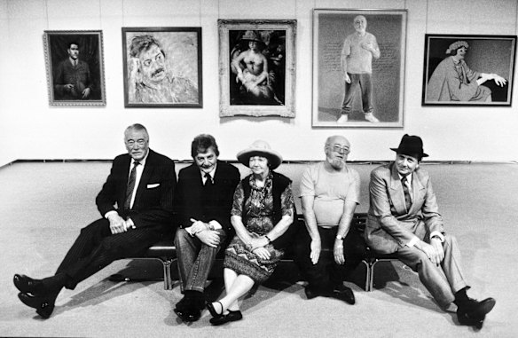The retired NSW governor Sir Roden Cutler, composer Peter Sculthorpe, artist Margaret Olley, author Thomas Keneally and entertainer Barry Humphries pose at the Art Gallery of NSW with their Archibald portraits in 1992. 