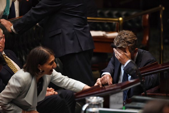 The Premier supports an exhausted Andrew Constance in Parliament in February.