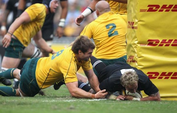 Jimmy Cowan touches down under the posts.