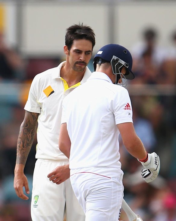 Mitchell Johnson has a word with Joe Root.