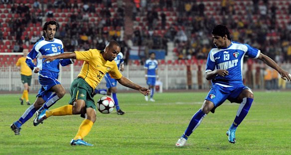 Ever nimble: Against Kuwait during an Asian Cup qualifier at Kuwait Sports Club Stadium in 2010. 