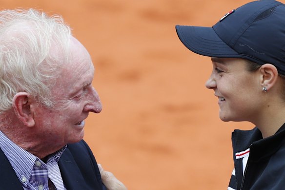Barty shares words with former Australian tennis ace Rod Laver at Roland Garros after winning her first major at the French Open in 2019. 