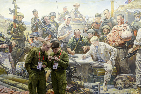 Youth Army members in front of Vassily Nesterenko’s painting, 'A Letter to Russia’s Enemies'. 