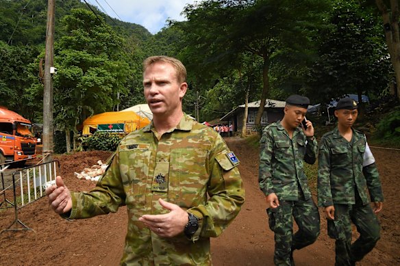 Australian military warrant officer Chris Moc (right) at the base camp where the rescue operations are being planned for 12 boys and their soccer coach who have been trapped inside Tham Luang cave for 11 days. 