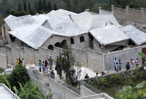 A  house which collapsed in Thomassin, 19 km east of Port-au-Prince.