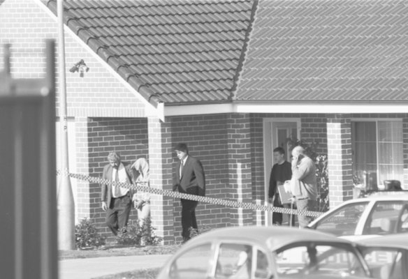 Detective Senior Sergeant Steve Leach, left, and other detectives taking Ivan Milat into custody after raiding his home in 1994.